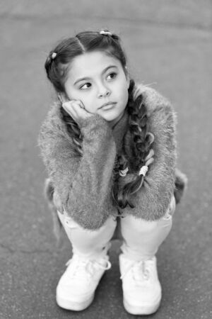 Autumn depression. Girl little kid sad face dislike something. Kid unhappy small baby. Reasons why kids dislike. Sadness concept. Kid in seasonal depression. Depression and emotional problemsの写真素材