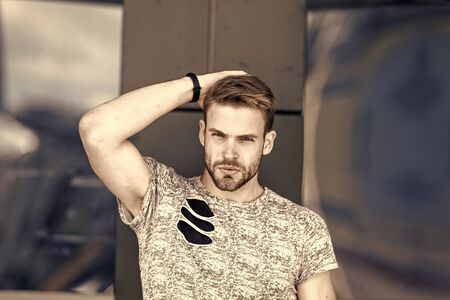 Skincare and male beauty concept. Modern people. Bearded hipster. Bearded man urban style. Beard grooming barbershop. Man stylish hair and healthy young skin. Guy unshaven bearded face and mustacheの写真素材