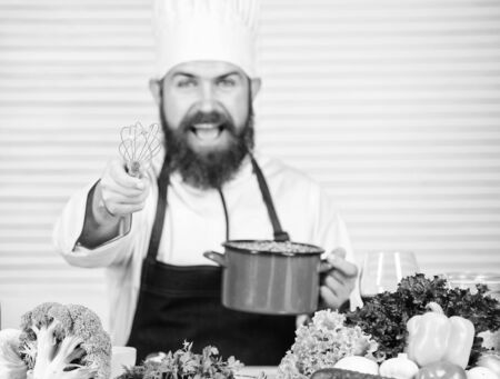 Cuisine culinary. Vitamin. Vegetarian salad with fresh vegetables. Healthy food cooking. Mature hipster with beard. Dieting organic food. Happy bearded man. chef recipe. What do you think about thisの写真素材