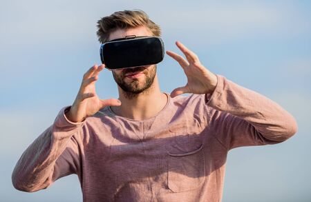 see the intangible. sexy man sky vr glasses. male reality. looking so modern. macho man wear wireless VR glasses.. create own business. Digital future and innovation. guy virtual reality gogglesの写真素材