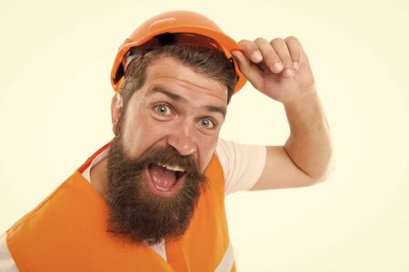 After long working day. Construction industry. Bearded brutal hipster safety engineer. Engineering career concept. Architect builder engineer. Man engineer protective uniform white backgroundの写真素材