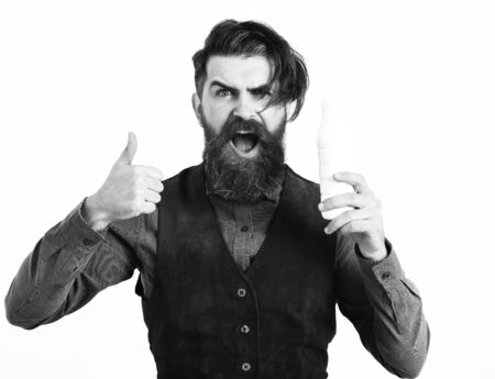 bearded man holding bottle of kefir with happy faceの写真素材