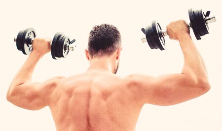 Sport lifestyle. Dumbbell exercise gym. Muscular man exercising with dumbbell rear view. Actions speak louder than coaches. Sportsman with strong back and arms. Sport equipment. Bodybuilding sport.の写真素材