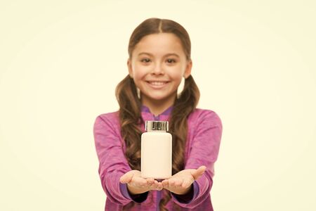 Feeling good. Digestive flora. Dietary supplement for children. Take vitamin supplements. Vitamin and medicine concept. Child take medicines. Need vitamin supplements. Enzymes for better digestionの写真素材