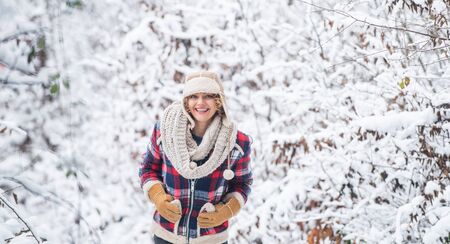 Portrait of excited woman in winter.の写真素材