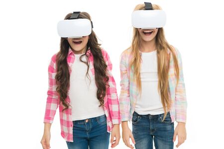 Virtual education. Kids wear hmd explore virtual or augmented reality. Future technology. Girls...
