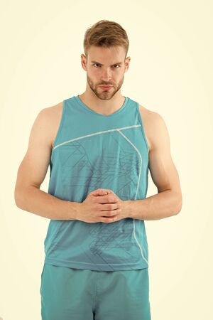 Sport is the way of his life. Man sporty outfit looks serious and strict white background. Guy...