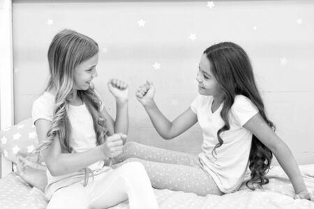 Children cheerful play bedroom.の写真素材