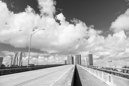 highway with skyscrapers on skyの写真素材