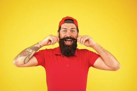 Moustache grooming guide. Hipster handsome guy touching moustache. Tips for growing and maintaining...