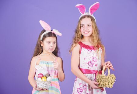 Some bunny loves you. Small girls in bunny headband for Easter celebration. Little girls wearing...