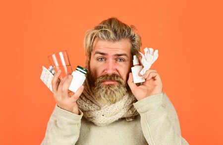 Bottle blister plastic container. Medicines effective treatment. Bearded guy messy hair hold pills...