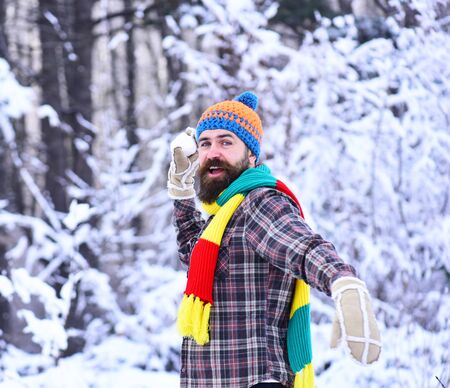 Happy winter vacation concept. Man with colorful hat.