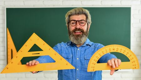 Smart and confident. exact sciences. happy bearded teacher in glasses. back to school. develop logic...