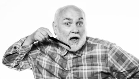 Personal care. cut and brush hair. shaving tool kit. mature bearded man isolated on white....