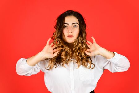 Hairdresser salon. Perfect look. Natural curls. Natural wavy hair texture. Woman with stylish curly...