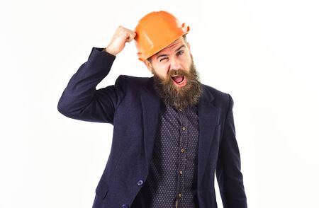 Builder or construction manager with long beard winks.の写真素材
