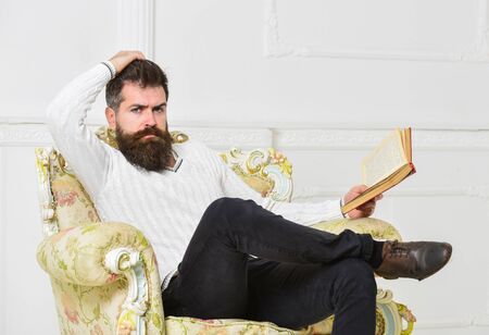 Reflections on literature concept. Connoisseur on thoughtful face finished reading book. Guy...
