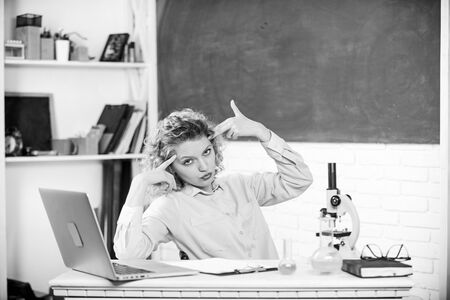 Girl tired stressful expression with laptop and microscope working investigation biology and...