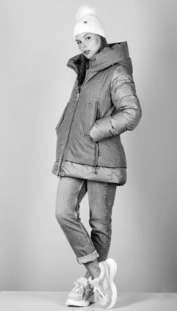 Street style. Girl wear fashion clothes. Winter outfit concept. Modern style. Look fashionable. Aesthetically pleasing style. Inspiring wardrobe. Purposeful layering is perfect way to achieve warmthの写真素材