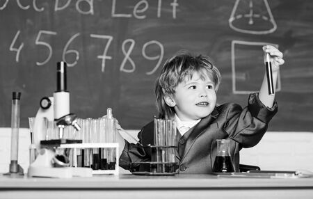 Boy microscope and test tubes school. Knowledge concept. Knowledge day. Inspiration for...