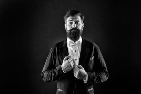 Classy is more stylish. Stylish groom black background. Bearded man in formal stylish look. Fashion and style. Prom and wedding attire. Elegant and stylishの写真素材
