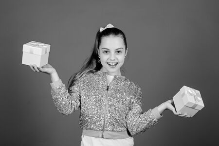 Boxing day. Christmas shopping. Surprise. Childrens day. Congratulation. Cheerful child. Little girl...