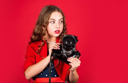 Learn use presets. Editing photos. Manual settings. Professional camera. Girl with retro camera....