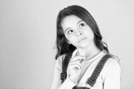 Little girl look up, dream eyes faceの写真素材