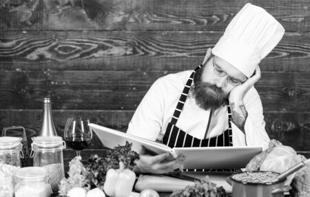 Vegetarian salad with fresh vegetables. Cuisine culinary. Vitamin. tired bearded man. chef recipe. Dieting organic food. Healthy food cooking. Mature hipster with beard. Having a healthy breakfastの写真素材