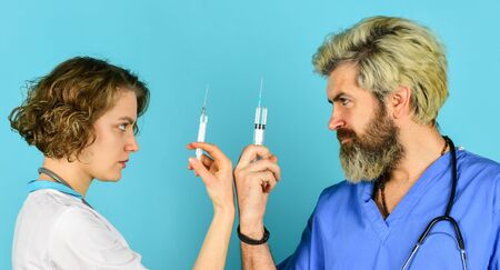 Drug medicines. Health care in hospital. Doctor syringe. Vaccination concept. Coronavirus prevention. Medicine vaccination equipment with needle. Nurse and doctor team. Free vaccination programの写真素材