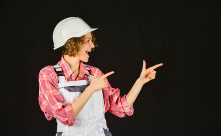 female builder in hardhat. woman engineer or architect working. planning home renovation. girl at...