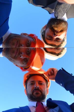 Coworking and construction concept. Board of architects with confident faces