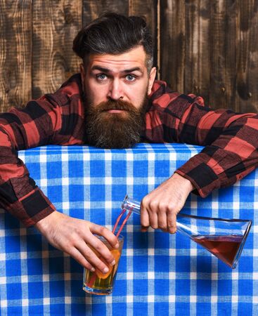 Hangover concept. Barman with beard and shocked faceの写真素材
