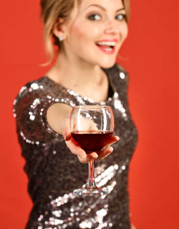 Girl holding cabernet or merlot with smiling faceの写真素材