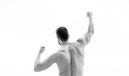 winning. Physical activity helps. muscular back man isolated on white. Man with muscular body and back. Achieve main goal. Future success depends on your efforts now. Daily motivation.の写真素材