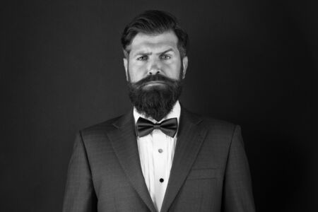 Make male grooming simpler and more enjoyable. Well groomed man beard in suit. Male fashion and aesthetic. Businessman formal outfit. Classic style aesthetic. Masculine aesthetic. Barber hairdresserの写真素材