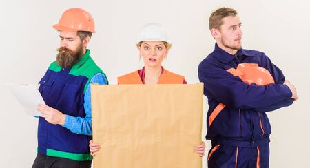 Disagreement concept. Builder, engineer, architect argue at workの写真素材
