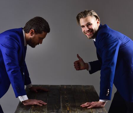 Men in suit or businessmen with exhausted and desperate expressionの写真素材