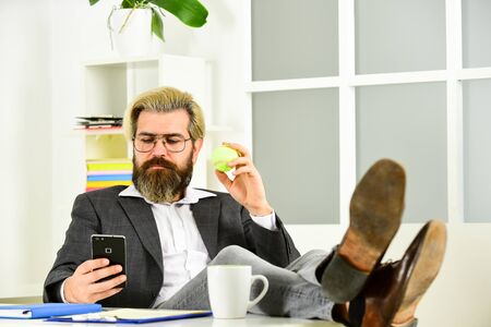 Office job. Business manager relaxing. Business concept. If you want to succeed, you have to take action. Successful man entrepreneur formal business suit sitting office interior. Brainstormingの写真素材