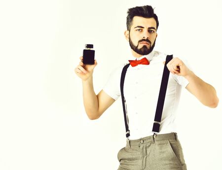 Bearded man, caucasian hipster with moustache and perfume bottleの写真素材