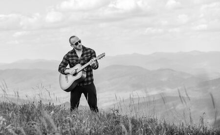 Your number one rock station. acoustic guitar player. country music song. sexy man with guitar....