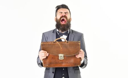 Screaming man concept. Angry man screaming with vintage briefcase