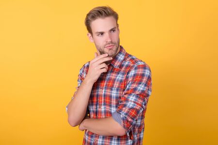 Casual style. Masculinity concept. Man beauty model. Interesting idea on his mind. Menswear shop. Macho man wearing checkered shirt. Fashion summer trends. Unshaven man skin care. Barbershop conceptの写真素材