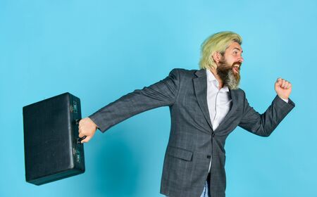 businessman hurry up with case. brutal mature man in jacket carry briefcase. running to business meeting. suitcase for office life. successful male boss. rush hour. deadlineの写真素材