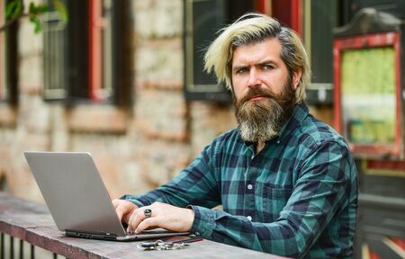 agile business. mature student working on computer. go shopping on cyber monday. bearded man hipster in cafe with laptop. online distant education. hipster inspired to work. Teachers dayの写真素材