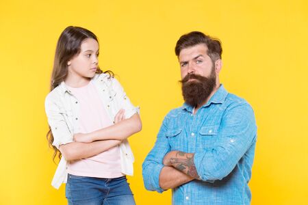 Focus on future. Little child look at father yellow background. Small child and bearded man. Raising child with love. Child care. International childrens day. Family relationsの写真素材