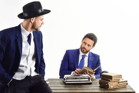 Businessman wears oldfashionate mafia hat. Men in suitsの写真素材