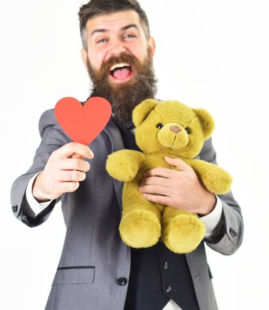 Love gifts concept Bearded man with happy face holds love gifts.の写真素材