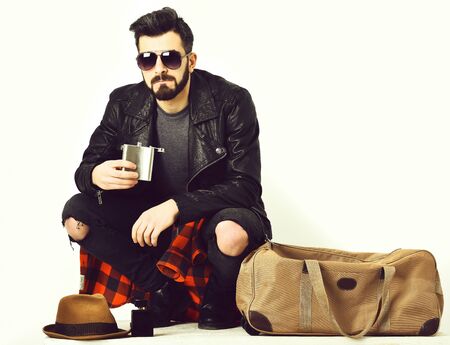 Bearded man, caucasian hipster with moustache holding flaskの写真素材